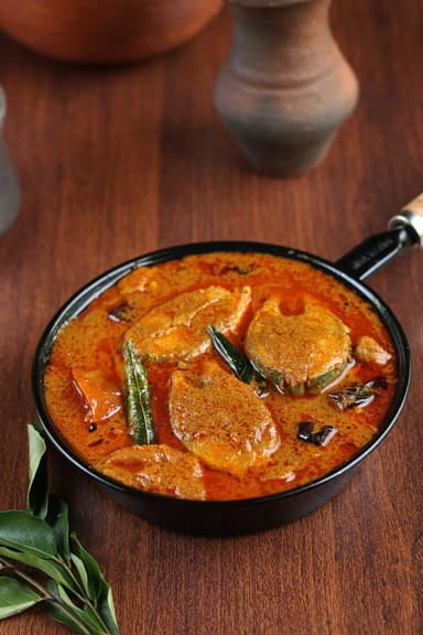 A flavorful Indian fish curry with a mix of spices and coconut milk
